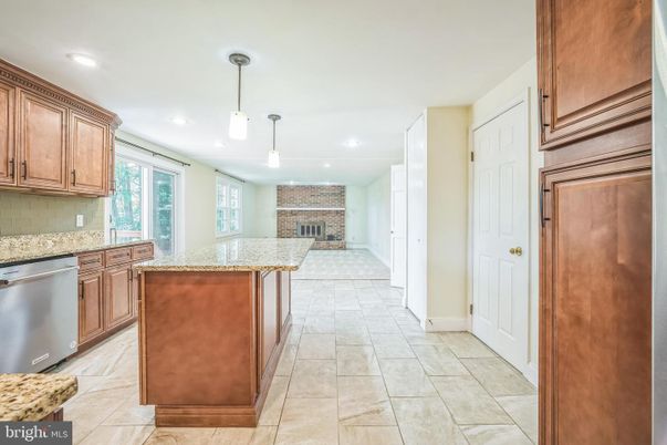 Fireplace, Interior, Kitchen, Pendant Lights, Recessed Lighting, Stone Walls