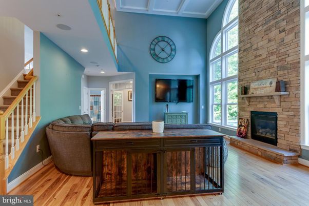 Fireplace, Interior, Recessed Lighting, Stone Walls, Wood Texture Flooring