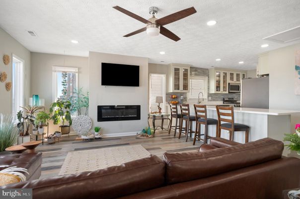Fireplace, Interior, Kitchen, Living room, Recessed Lighting, Wood Texture Flooring