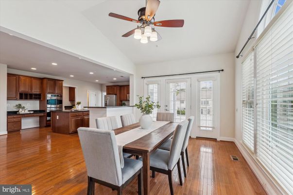 Dining room, Interior, Kitchen, Recessed Lighting, Stainless Steel Appliances, Wood Texture Flooring