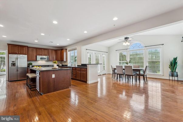Dining room, Interior, Kitchen, Recessed Lighting, Stainless Steel Appliances, Wood Texture Flooring