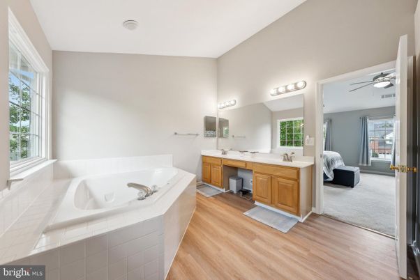 Bathroom, Dual Sink Vanities, Interior, Tile Countertops, Wood Texture Flooring