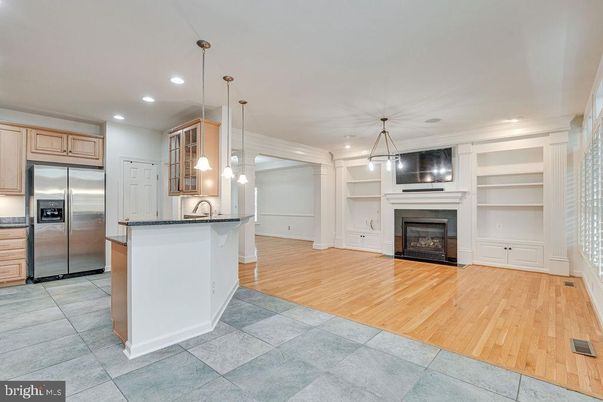 Fireplace, Interior, Kitchen, Pendant Lights, Recessed Lighting, Stainless Steel Appliances, Wood Texture Flooring