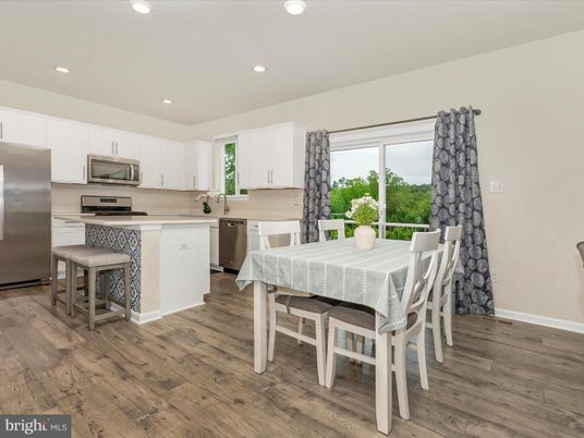 Dining room, Interior, Kitchen, Recessed Lighting, Stainless Steel Appliances, Wood Texture Flooring