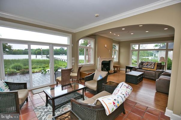 Fireplace, Interior, Living room, Recessed Lighting, Water, Wood Texture Flooring