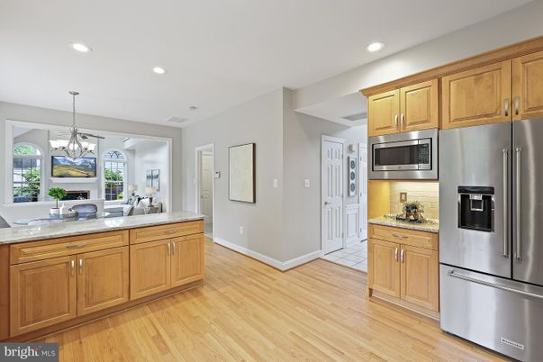 Chandelier, Interior, Kitchen, Pendant Lights, Recessed Lighting, Stainless Steel Appliances, Wood Texture Flooring