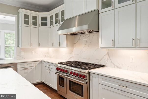 Interior, Kitchen, Marble Walls, Stainless Steel Appliances, Wood Texture Flooring