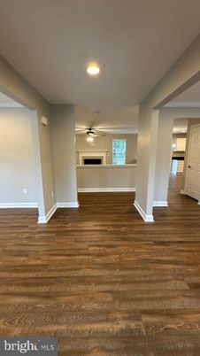 Empty room, Fireplace, Interior, Recessed Lighting, Wood Texture Flooring
