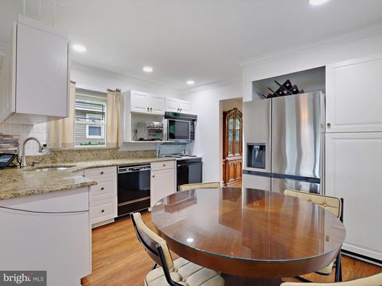 Dining room, Interior, Kitchen, Recessed Lighting, Stainless Steel Appliances, Wood Texture Flooring