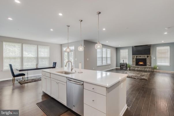 Dining room, Fireplace, Interior, Kitchen, Living room, Pendant Lights, Recessed Lighting, Wood Texture Flooring
