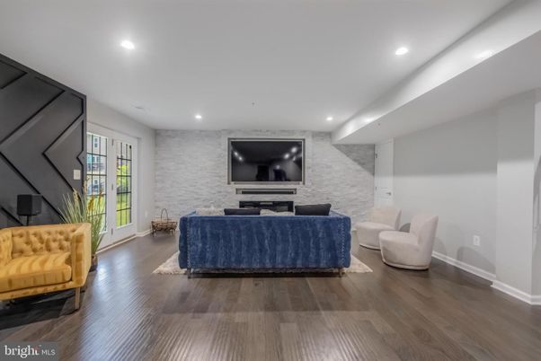 Interior, Living room, Marble Walls, Recessed Lighting, Wood Texture Flooring