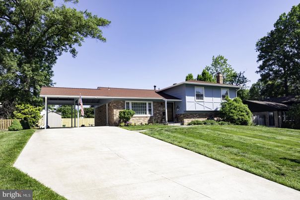 Attached, Backyard, Exterior, Facade, Brick Facade, Ranch