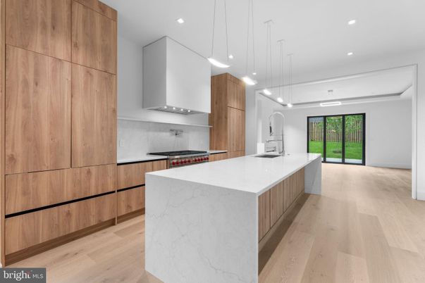 Interior, Kitchen, Marble Walls, Pendant Lights, Recessed Lighting, Wood Texture Flooring