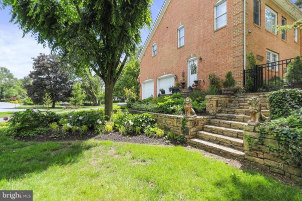 Attached, Backyard, Exterior, Facade, Brick Facade, None