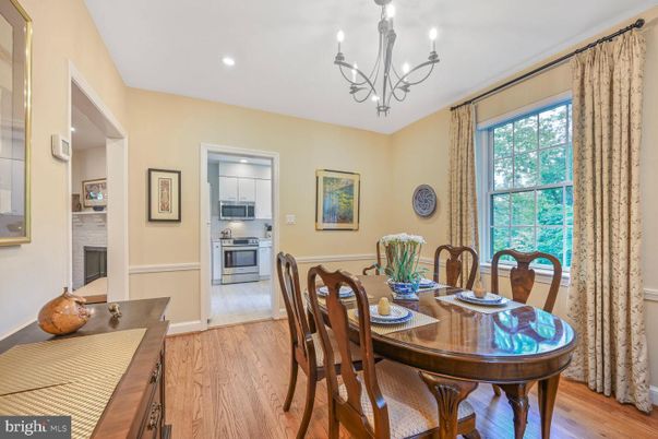 Chandelier, Dining room, Fireplace, Interior, Kitchen, Recessed Lighting, Wood Texture Flooring