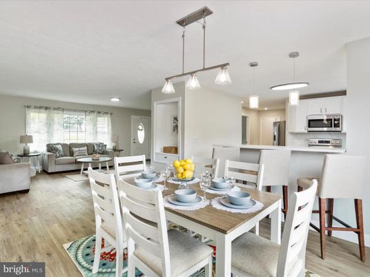 Dining room, Interior, Kitchen, Living room, Pendant Lights, Recessed Lighting, Stainless Steel Appliances, Wood Texture Flooring