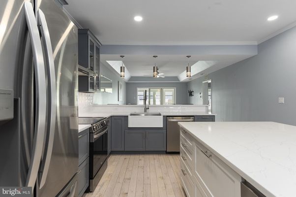 Interior, Kitchen, Pendant Lights, Recessed Lighting, Stainless Steel Appliances, Wood Texture Flooring
