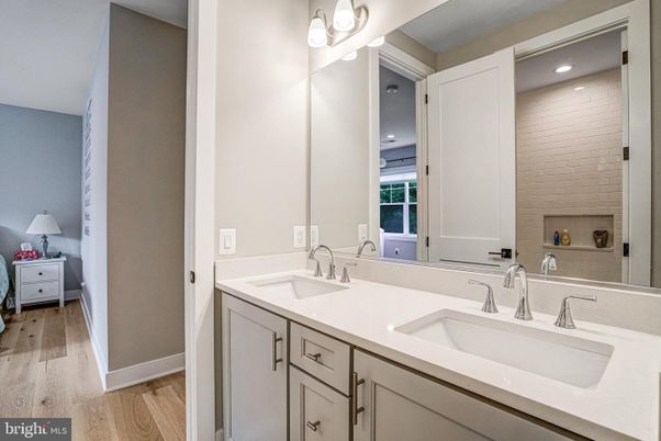 Bathroom, Dual Sink Vanities, Interior, Recessed Lighting, Wood Texture Flooring
