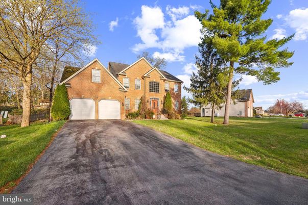Attached, Backyard, Exterior, Facade, Brick Facade, French Provincial