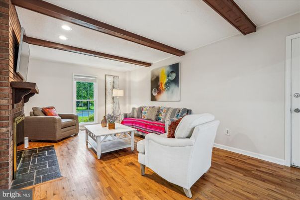 Fireplace, Interior, Living room, Recessed Lighting, Stone Walls, Wooden Beams, Wood Texture Flooring