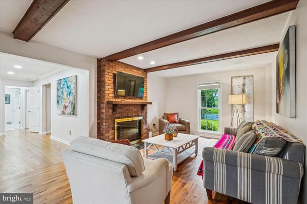 Fireplace, Interior, Living room, Recessed Lighting, Stone Walls, Wooden Beams, Wood Texture Flooring