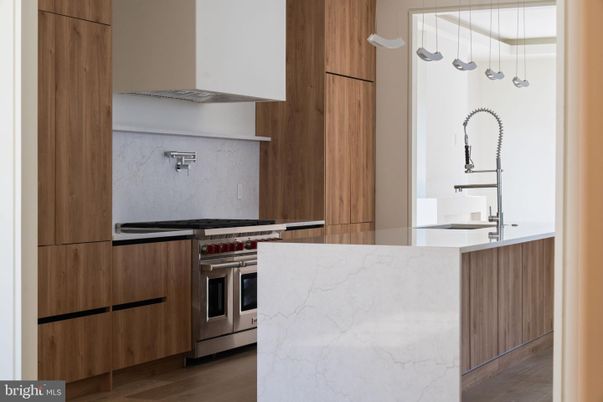 Interior, Kitchen, Marble Walls, Stainless Steel Appliances, Wood Texture Flooring