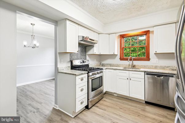 Chandelier, Interior, Kitchen, Pendant Lights, Stainless Steel Appliances, Wood Texture Flooring
