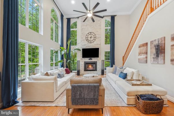 Fireplace, Interior, Living room, Recessed Lighting, Stone Walls, Wood Texture Flooring