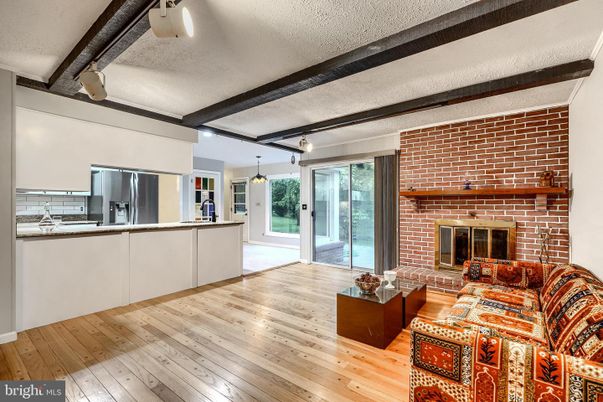 Fireplace, Interior, Kitchen, Living room, Pendant Lights, Stone Walls, Wood Texture Flooring