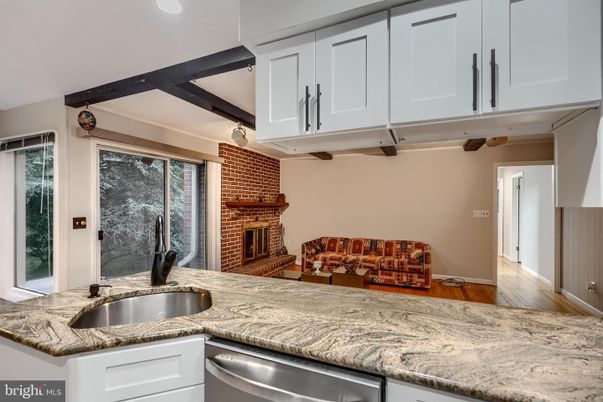 Fireplace, Interior, Kitchen, Recessed Lighting, Stone Walls, Wood Texture Flooring