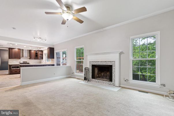Empty room, Fireplace, Interior, Kitchen, Stainless Steel Appliances