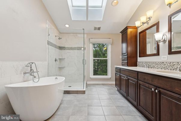 Bathroom, Dual Sink Vanities, Free Standing Baths, Glass Shower, Interior, Marble Walls, Recessed Lighting