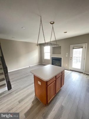 Empty room, Fireplace, Interior, Recessed Lighting, Wood Texture Flooring