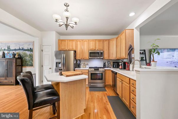 Chandelier, Interior, Kitchen, Recessed Lighting, Stainless Steel Appliances, Wood Texture Flooring