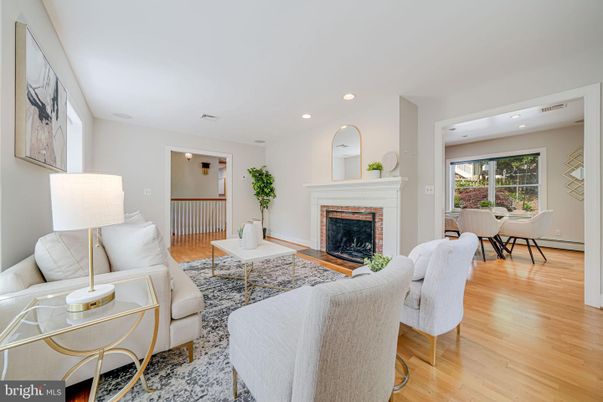 Dining room, Fireplace, Interior, Living room, Recessed Lighting, Wood Texture Flooring