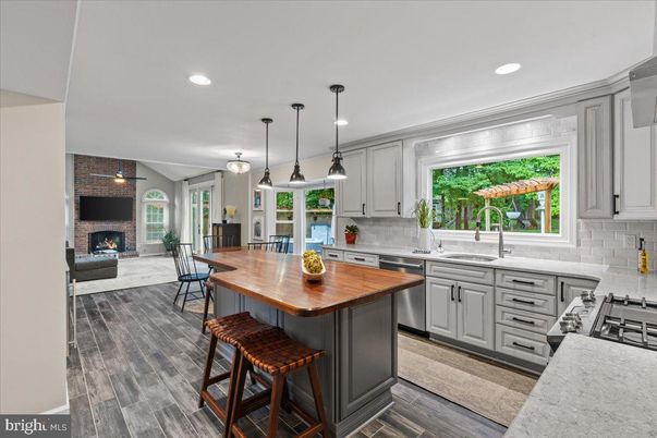 Dining room, Fireplace, Interior, Kitchen, Pendant Lights, Recessed Lighting, Stone Walls, Wood Texture Flooring