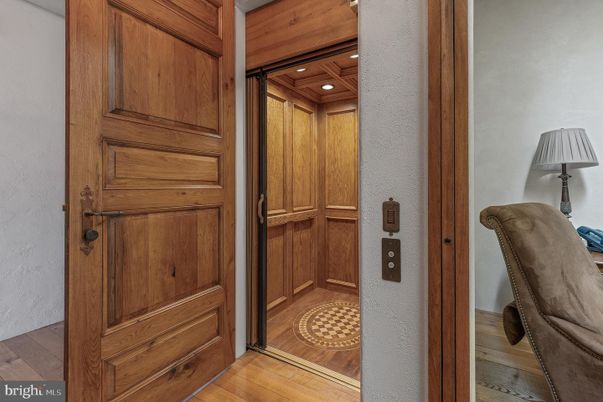 Elevator, Interior, Recessed Lighting, Wooden Ceilings, Wood Texture Flooring, Wooden Walls