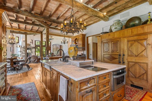 Chandelier, Dining room, Interior, Kitchen, Stainless Steel Appliances, Wooden Beams, Wooden Ceilings, Wood Texture Flooring
