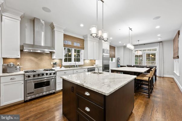 Chandelier, Dining room, Interior, Kitchen, Pendant Lights, Recessed Lighting, Stainless Steel Appliances, Wood Texture Flooring