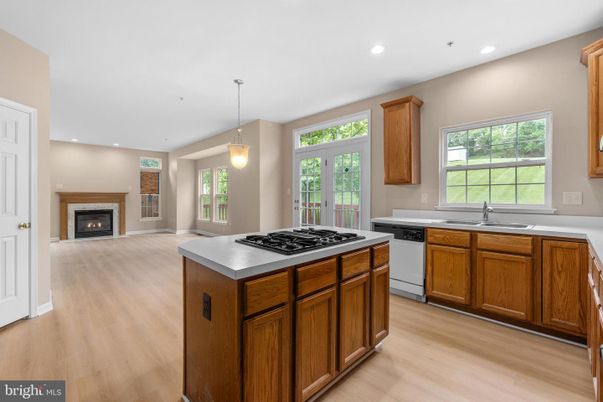 Fireplace, Interior, Kitchen, Pendant Lights, Recessed Lighting, Wood Texture Flooring