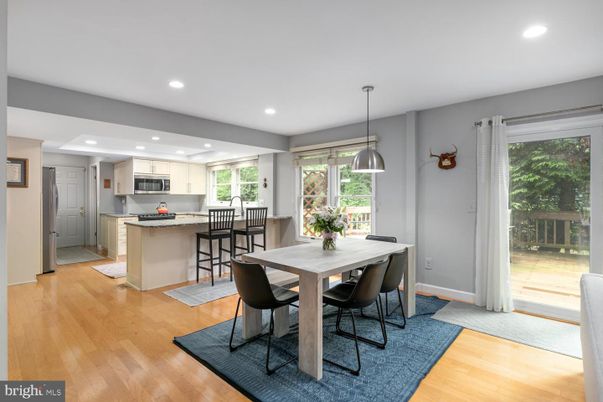 Dining room, Interior, Kitchen, Pendant Lights, Recessed Lighting, Stainless Steel Appliances, Wood Texture Flooring