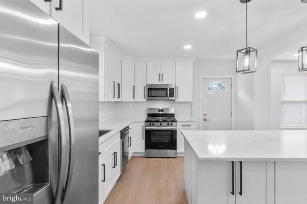 Interior, Kitchen, Pendant Lights, Recessed Lighting, Stainless Steel Appliances, Wood Texture Flooring