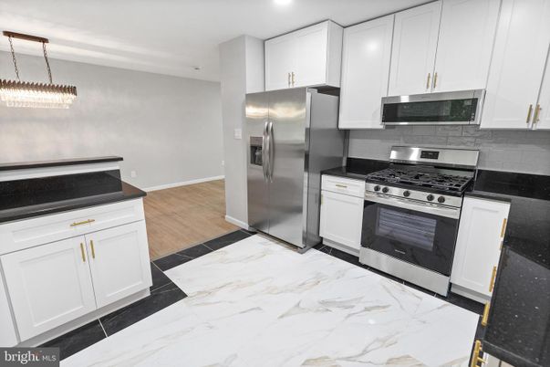 Interior, Kitchen, Marble, Pendant Lights, Recessed Lighting, Stainless Steel Appliances, Wood Texture Flooring