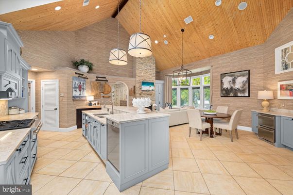 Dining room, Interior, Kitchen, Living room, Pendant Lights, Recessed Lighting, Stainless Steel Appliances, Stone Walls, Wooden Beams, Wooden Ceilings