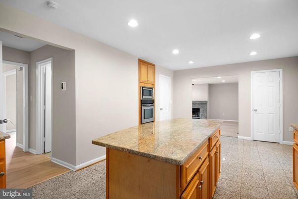 Fireplace, Interior, Kitchen, Recessed Lighting, Wood Texture Flooring