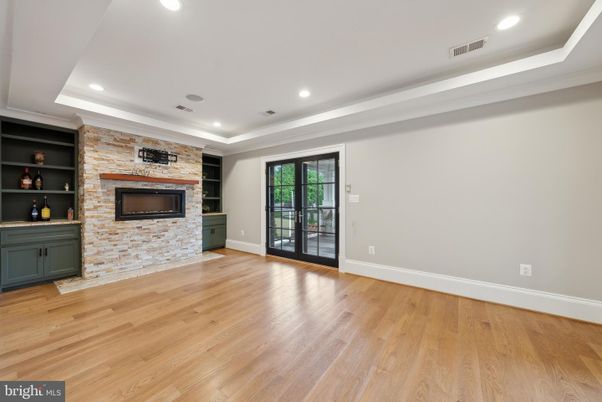 Fireplace, Interior, Recessed Lighting, Stone Walls, Wood Texture Flooring