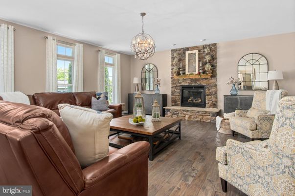 Chandelier, Fireplace, Interior, Living room, Stone Walls, Wood Texture Flooring