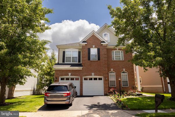 Attached, Exterior, Facade, Brick Facade, Brick Traditional