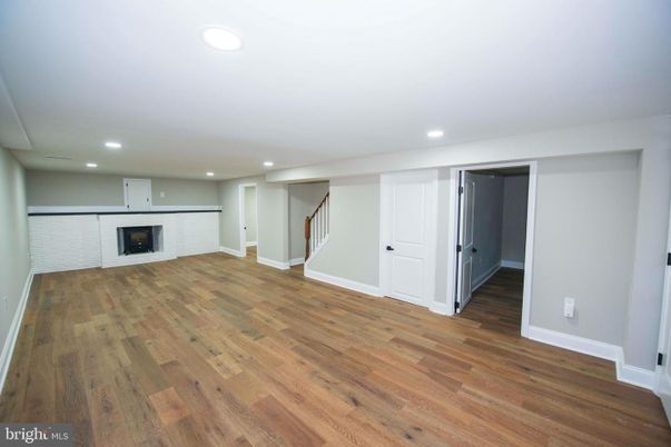 Empty room, Fireplace, Interior, Recessed Lighting, Wood Texture Flooring