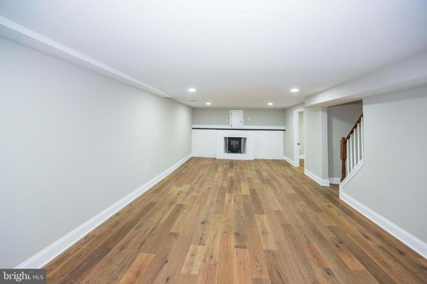 Empty room, Fireplace, Interior, Recessed Lighting, Wood Texture Flooring